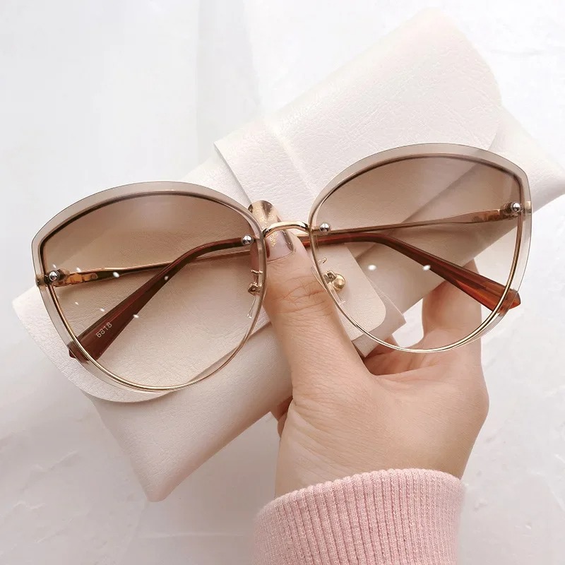 Hoogwaardige ovale randloze zo - Sunglasses Cat Eye recensie en prijs